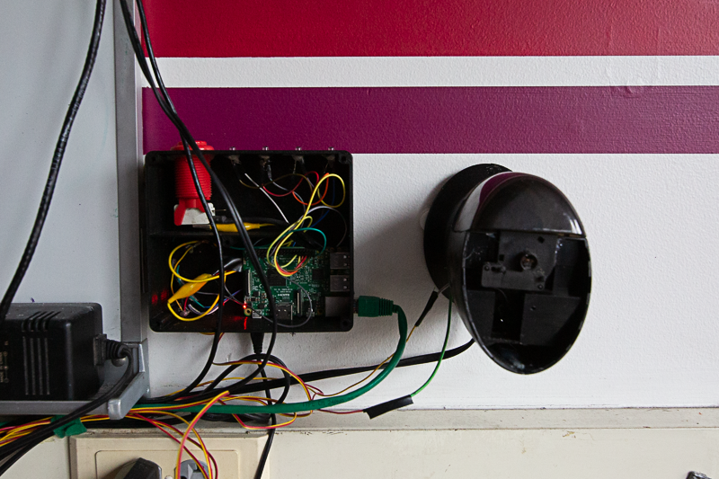 A raspberry pi and pencil sharpener on the wall, CSH's letmein system