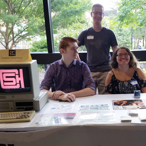 CSHers manning a booth at an RIT Open House