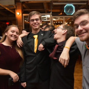 A group of CSHers dressed formally for Holiday Dinner