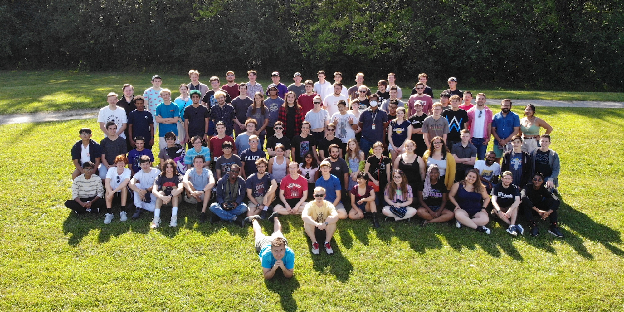 A group of CSHers standing in front of a lake